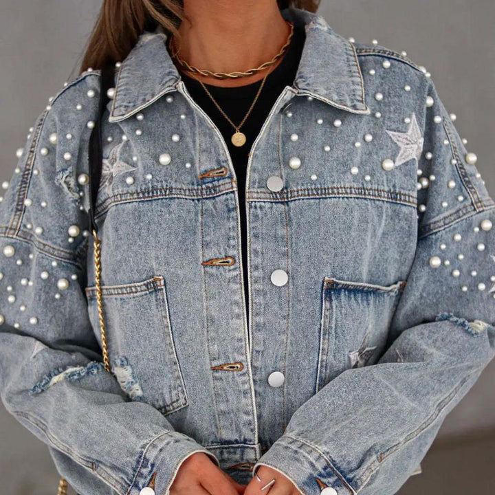 Denim jacket with pearl embellishment and star accents